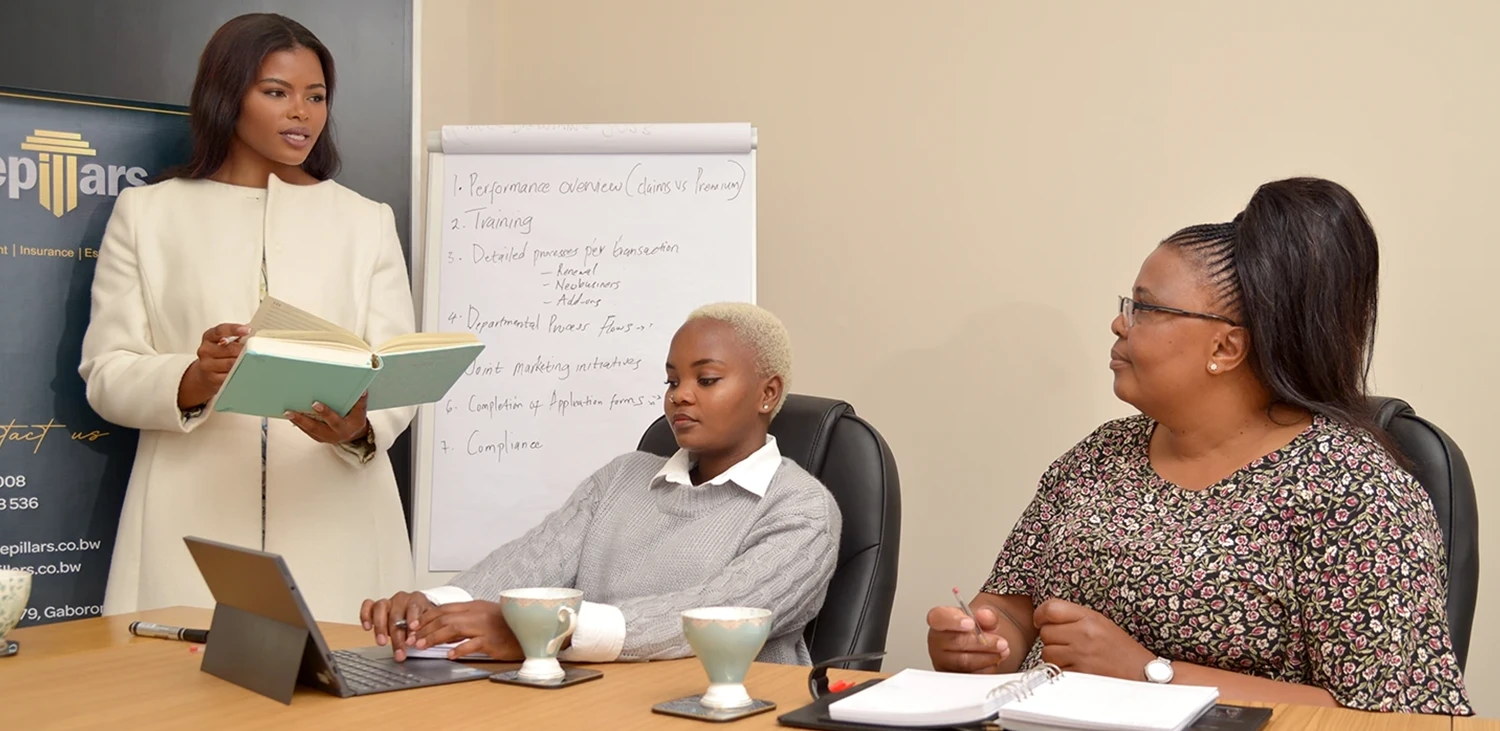 Charity Moyo and team